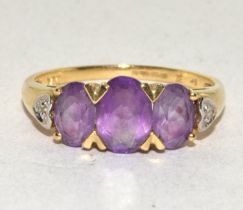 9ct gold ladies Diamond and Amethyst ring hallmarked as Diamond in the ring 2.2g size O