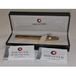 Boxed Sheaffer pen with paperwork.
