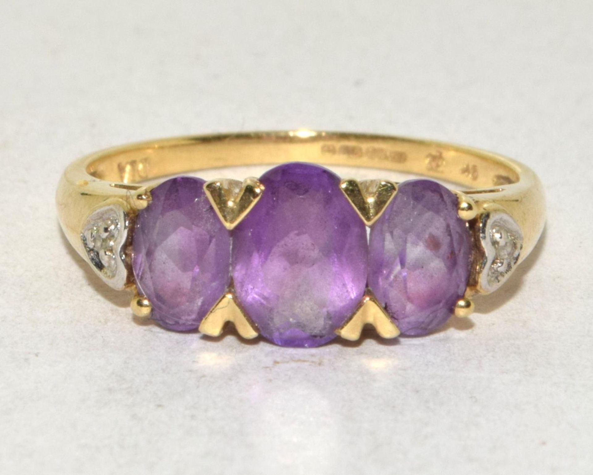 9ct gold ladies Diamond and Amethyst ring hallmarked as Diamond in the ring 2.2g size O - Image 5 of 5
