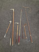 Collection of vintage horse whips (8).