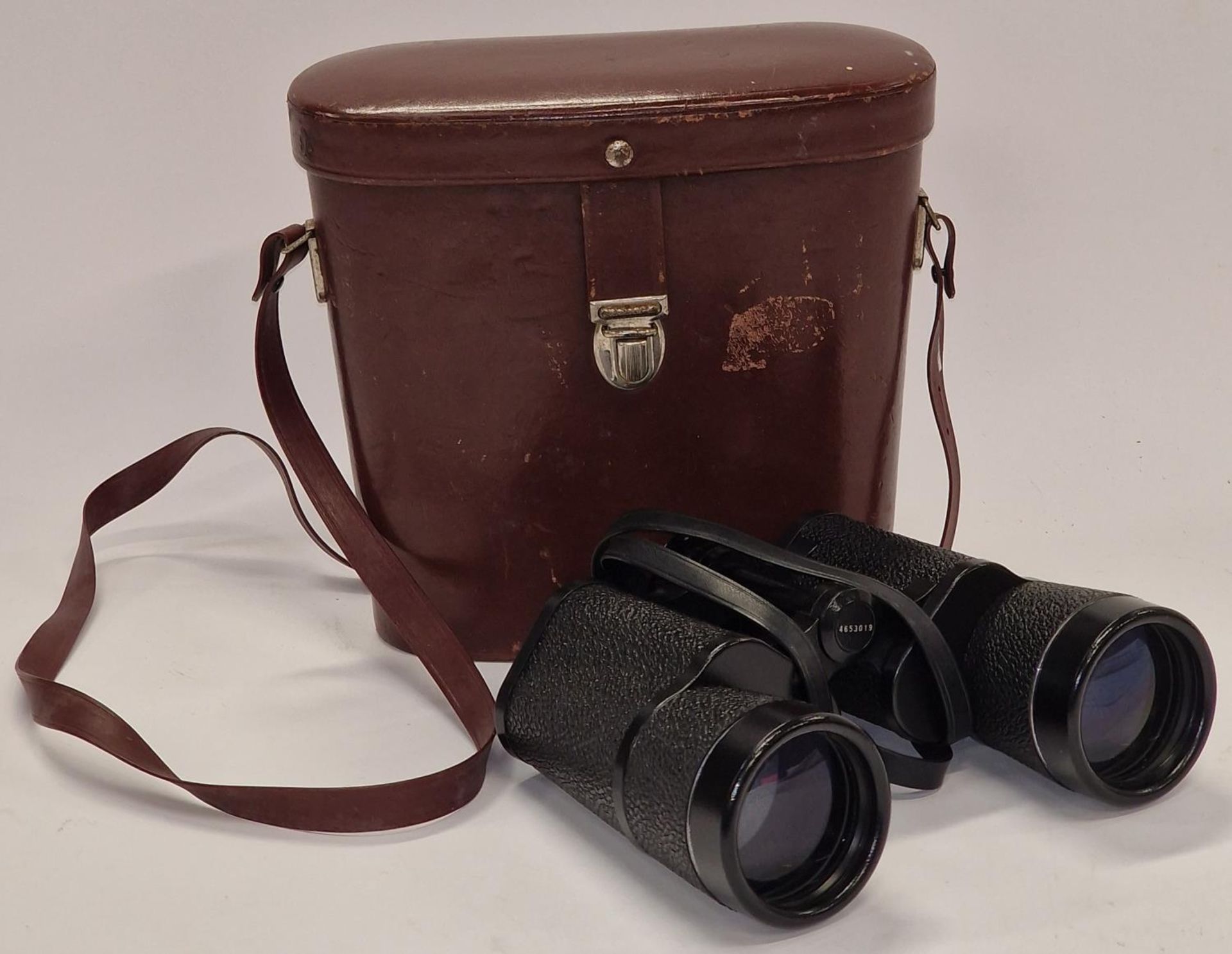 A pair of Carl Zeiss Jenoptem 10x50 binoculars with original case.