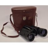 A pair of Carl Zeiss Jenoptem 10x50 binoculars with original case.