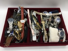 A tray containing a quantity of watches.