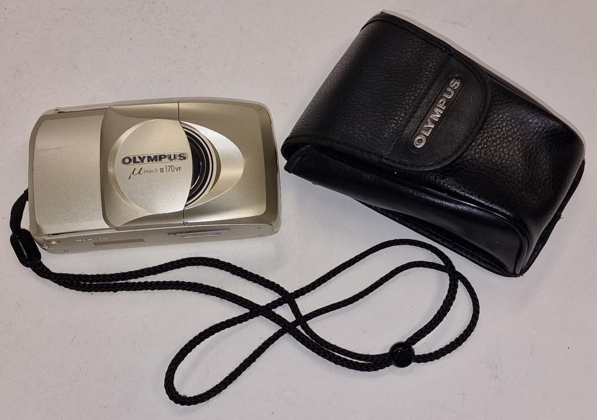 Olympus mju II vintage compact 35mm film camera c/w original soft case. Not tested however battery