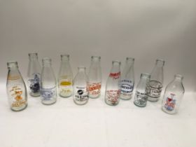 Various glass advertising bottles. (11)