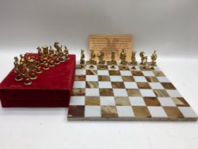 A chess set with marble board.