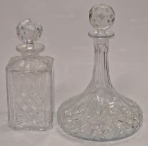 Two crystal glass decanters.