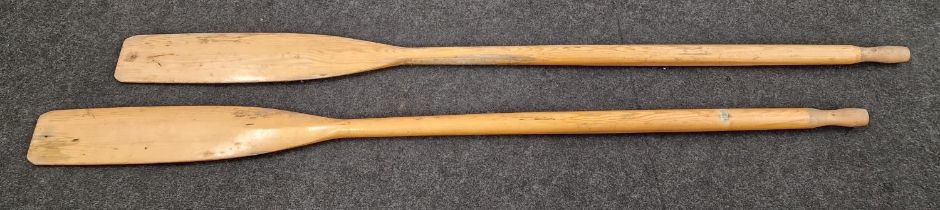 Pair of vintage wooden oars.