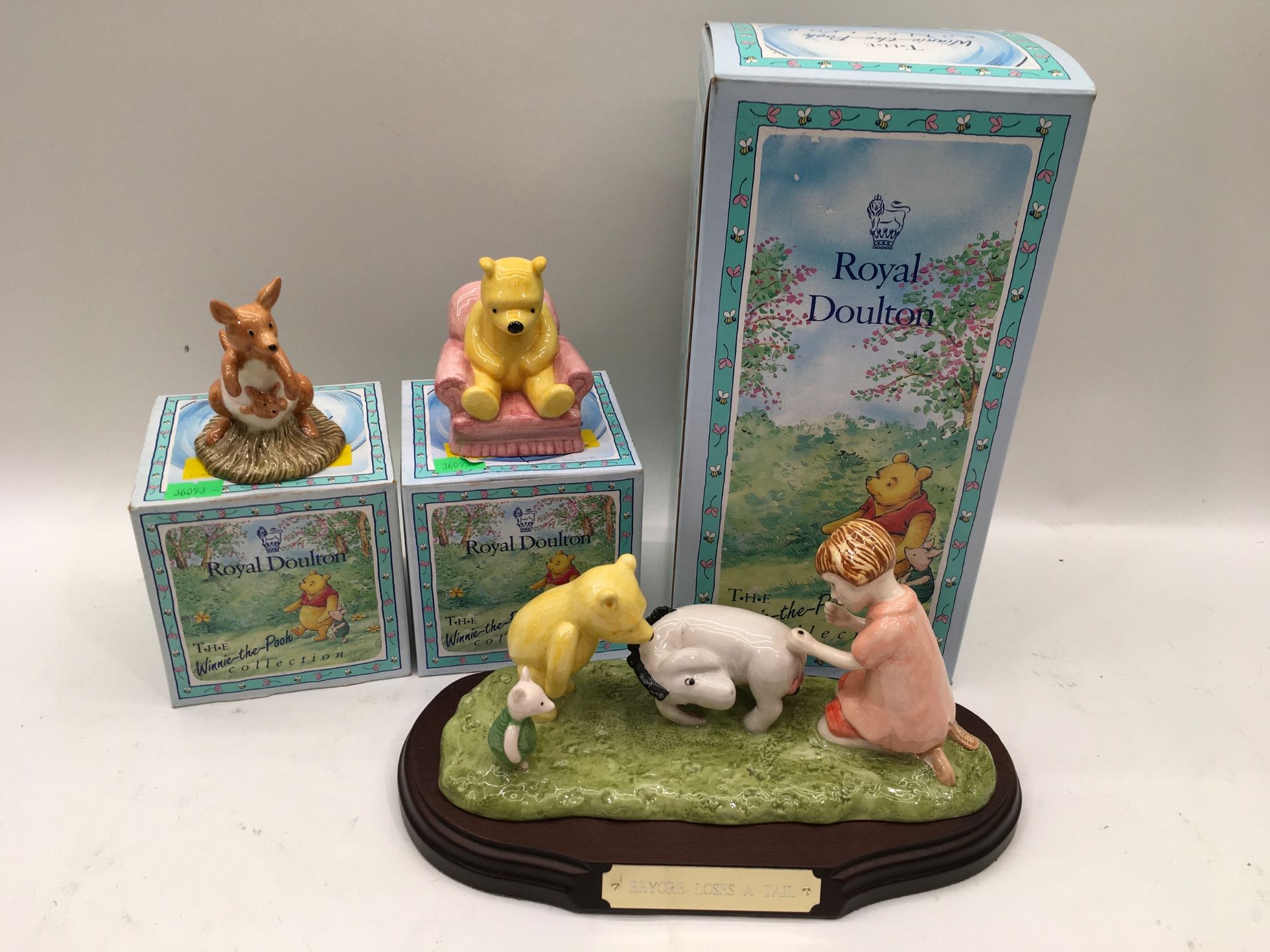 Three Royal Doulton The Winnie the Pooh collection figures.