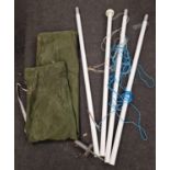 A collapsible flag pole in carry bag. comes in four pieces.