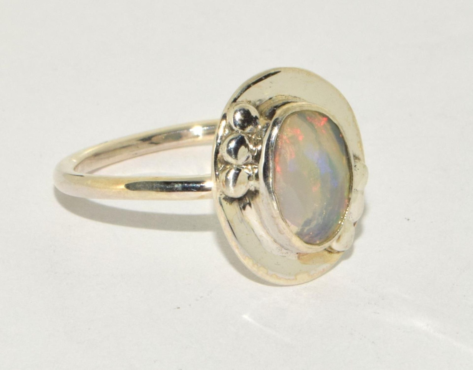 Natural Firey opal and silver ring Size T 1/2.