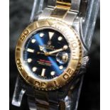 Rolex Yacht Master Superlative Chronometer. Factory blue dial with bi-metal Oyster bracelet. 35mm