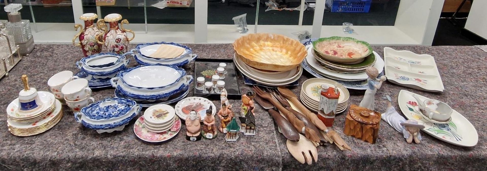 Large collection of various chinaware items to include Poole Pottery and figurines.