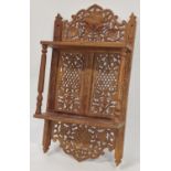 Vintage carved wood Indian wall shelf possibly a grape rack 52cm tall.