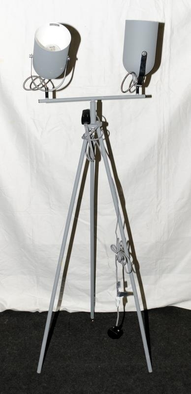 Pair of adjustable lamps on a tripod base. 115cms tall
