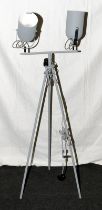 Pair of adjustable lamps on a tripod base. 115cms tall