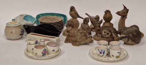 A quantity of Poole Pottery to include stoneware animals and some traditional pieces.
