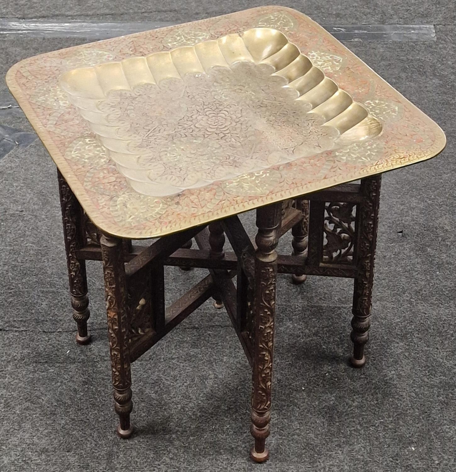 Vintage oriental carved folding table with removable brass top 46x48x49cm.