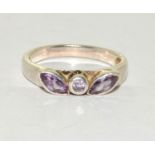 A 925 silver and amethyst ring Size P