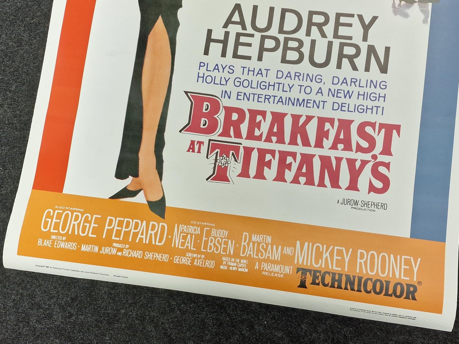 Reproduction rolled film poster for "Breakfast at Tiffany's" starring Audrey Hepburn and George - Image 2 of 3