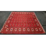 Large room size red patterned carpet 400x304cm.