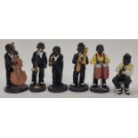 A collection of six band member ornaments