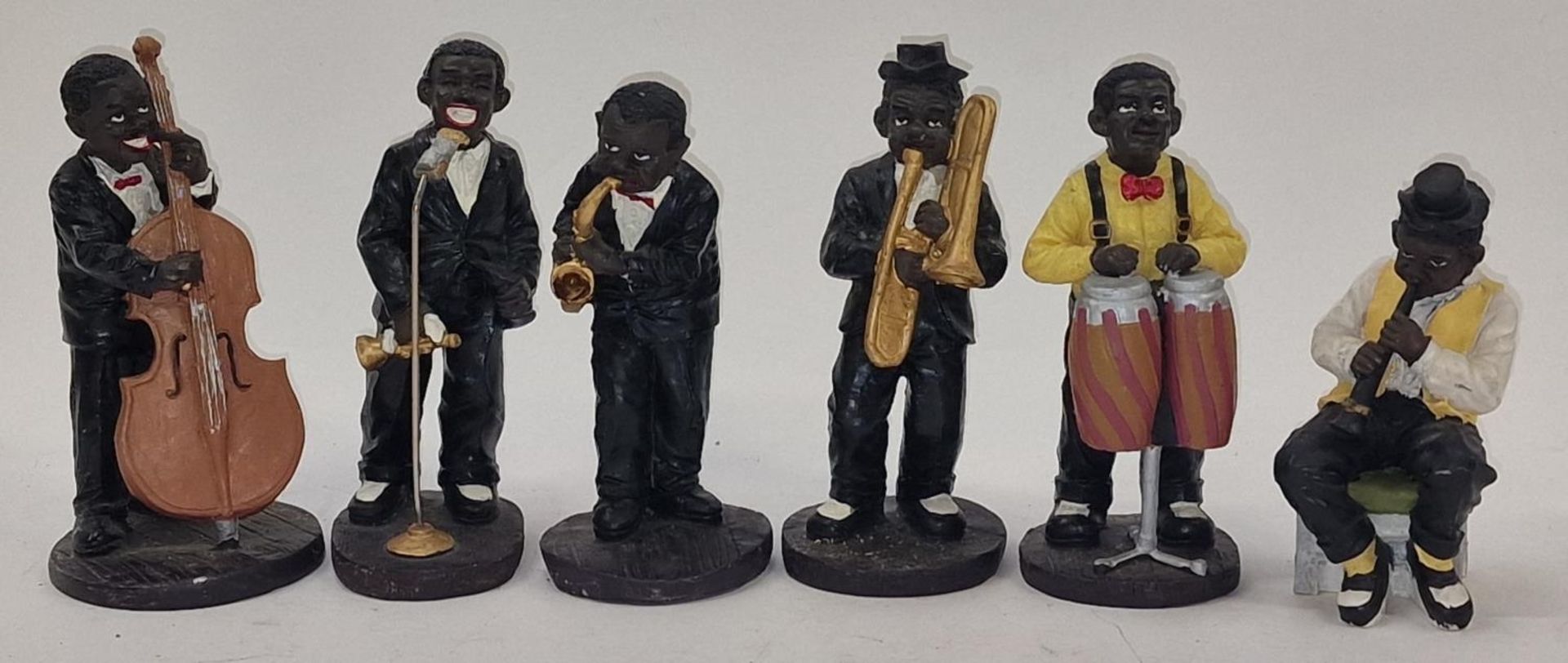 A collection of six band member ornaments