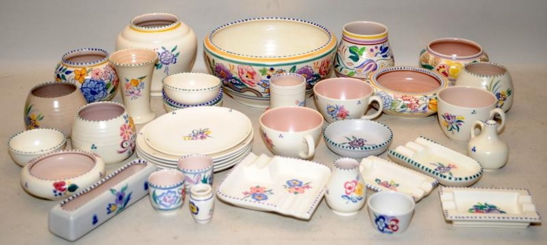 Large collection of vintage Poole Pottery in the traditional patterns
