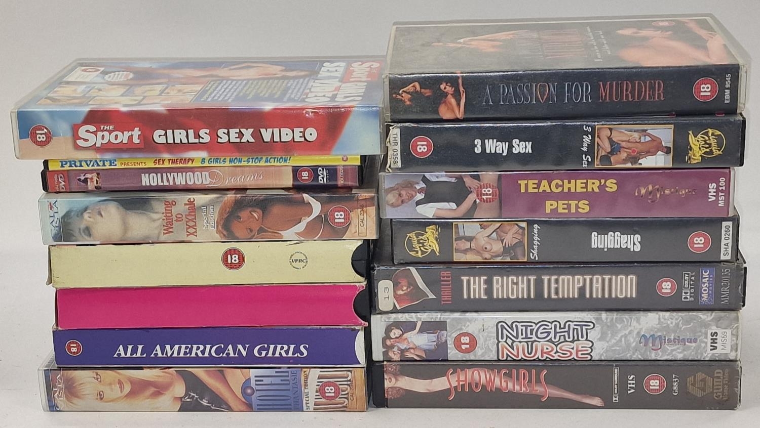 Collection of adult VHS tapes and DVD's.