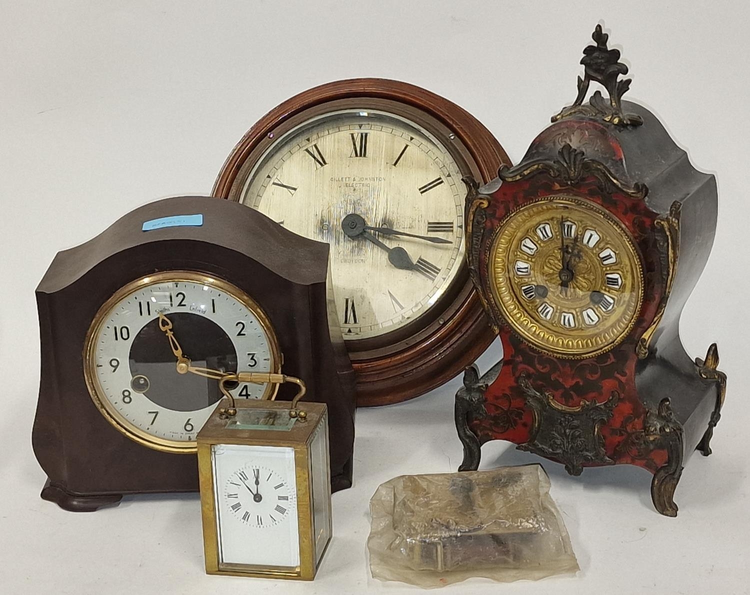 Collection of vintage clocks to include a Smiths Enfield together with a spare clock movement part.