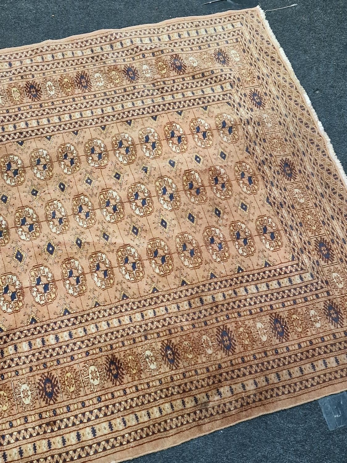 Vintage patterned carpet on brown ground 195x124cm. - Image 3 of 4