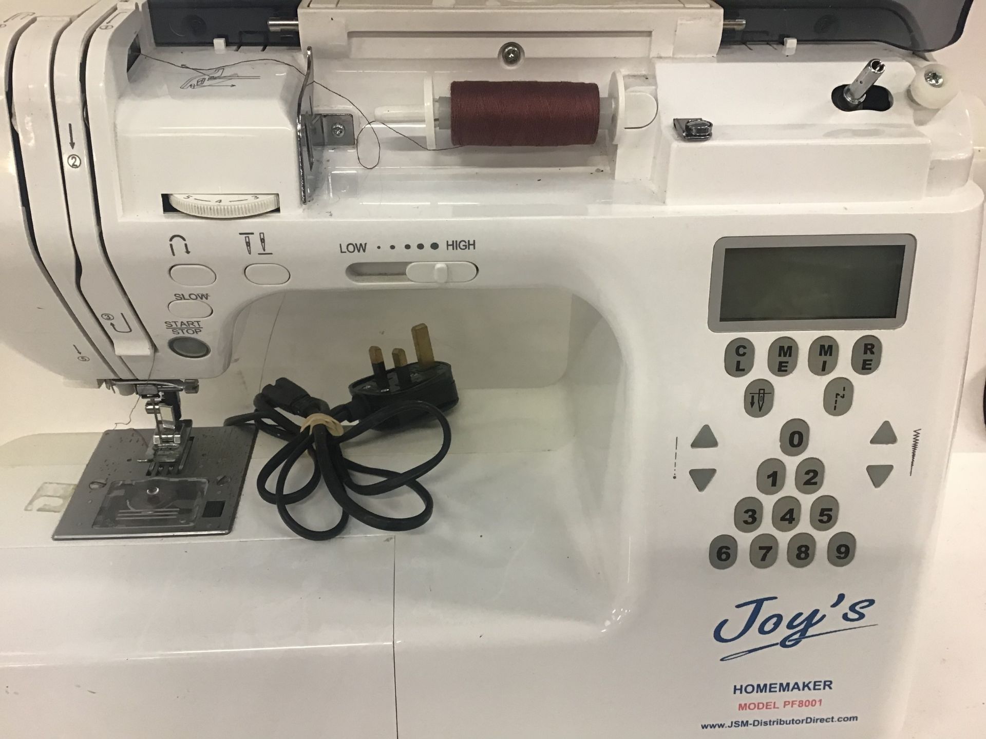Joy’s Homemaker electric sewing machine model No. PF8001.