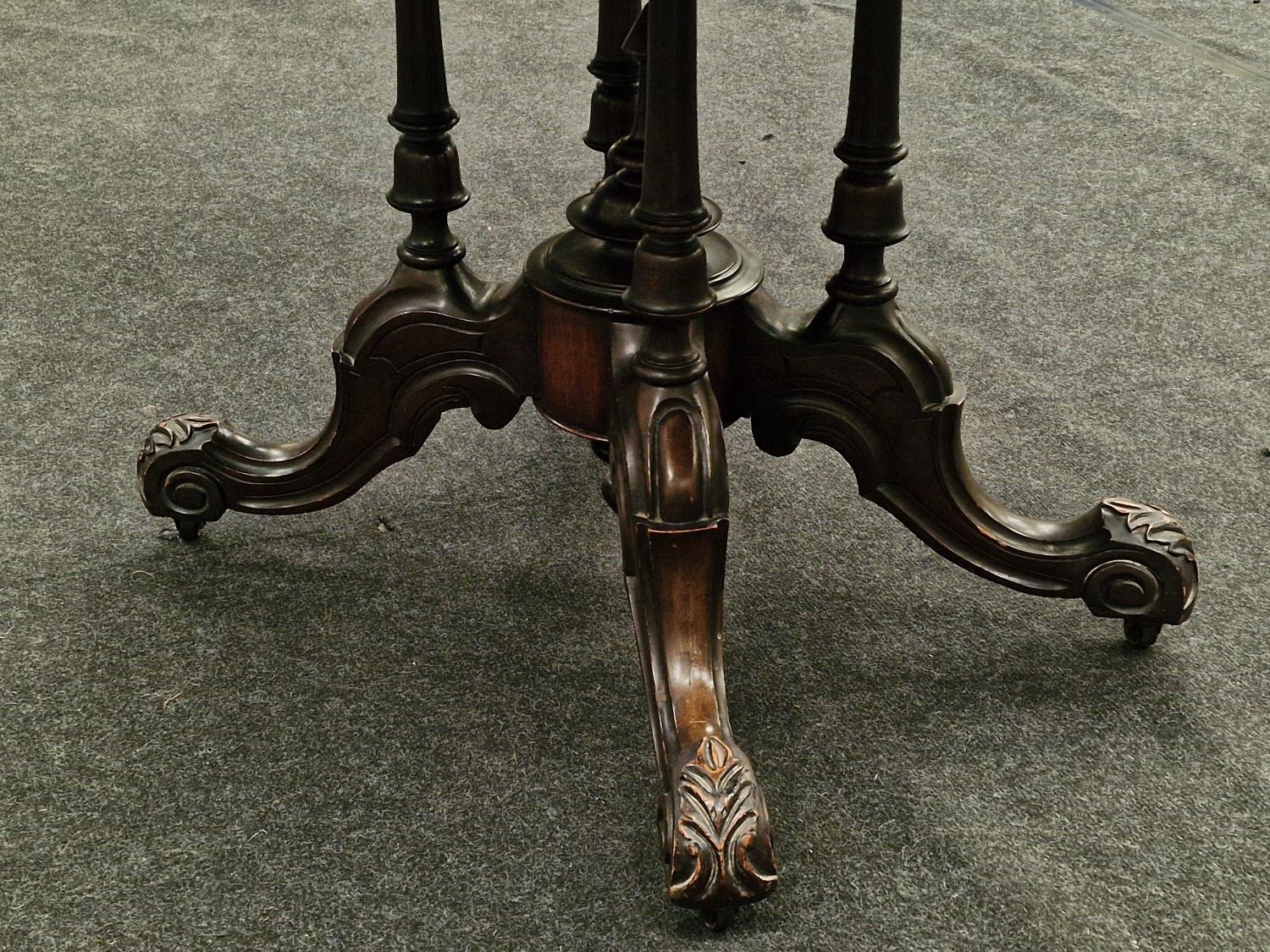 Victorian burr walnut oval tilt top loo table on ornate four column base with castors 74x120x88cm. - Image 3 of 3