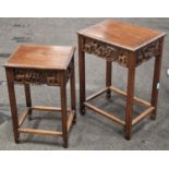 Set of two oriental mahogany carved occasional tables largest measuring 62x45x34cm.