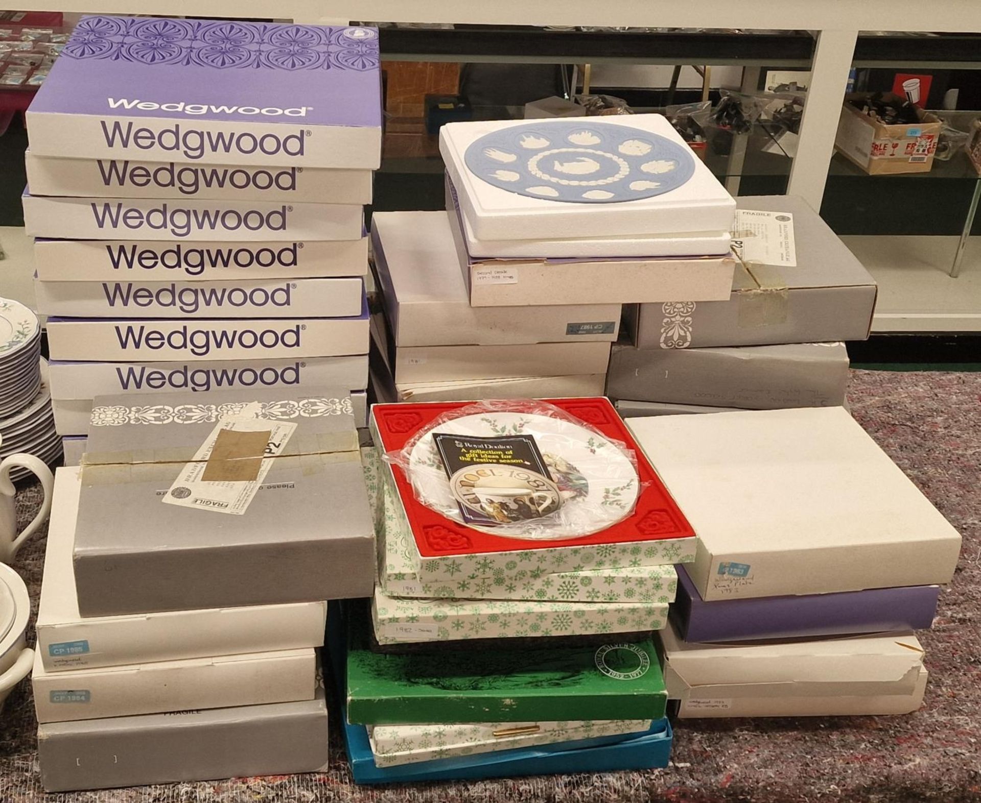 Large collection of mainly Wedgwood collectable boxed Christmas plates together with some from other