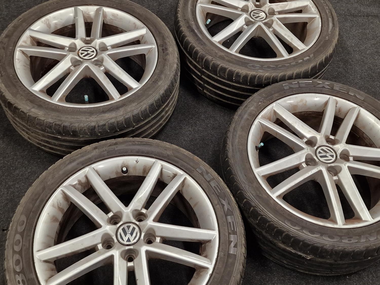 A set of four Volkswagen wheel alloys with tyres attached. - Image 2 of 3