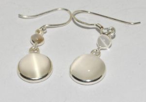 Large natural moonstone and silver drop earrings.