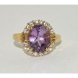 Large vintage amethyst and diamond 9ct gold cluster ting, 4.9g, Size t