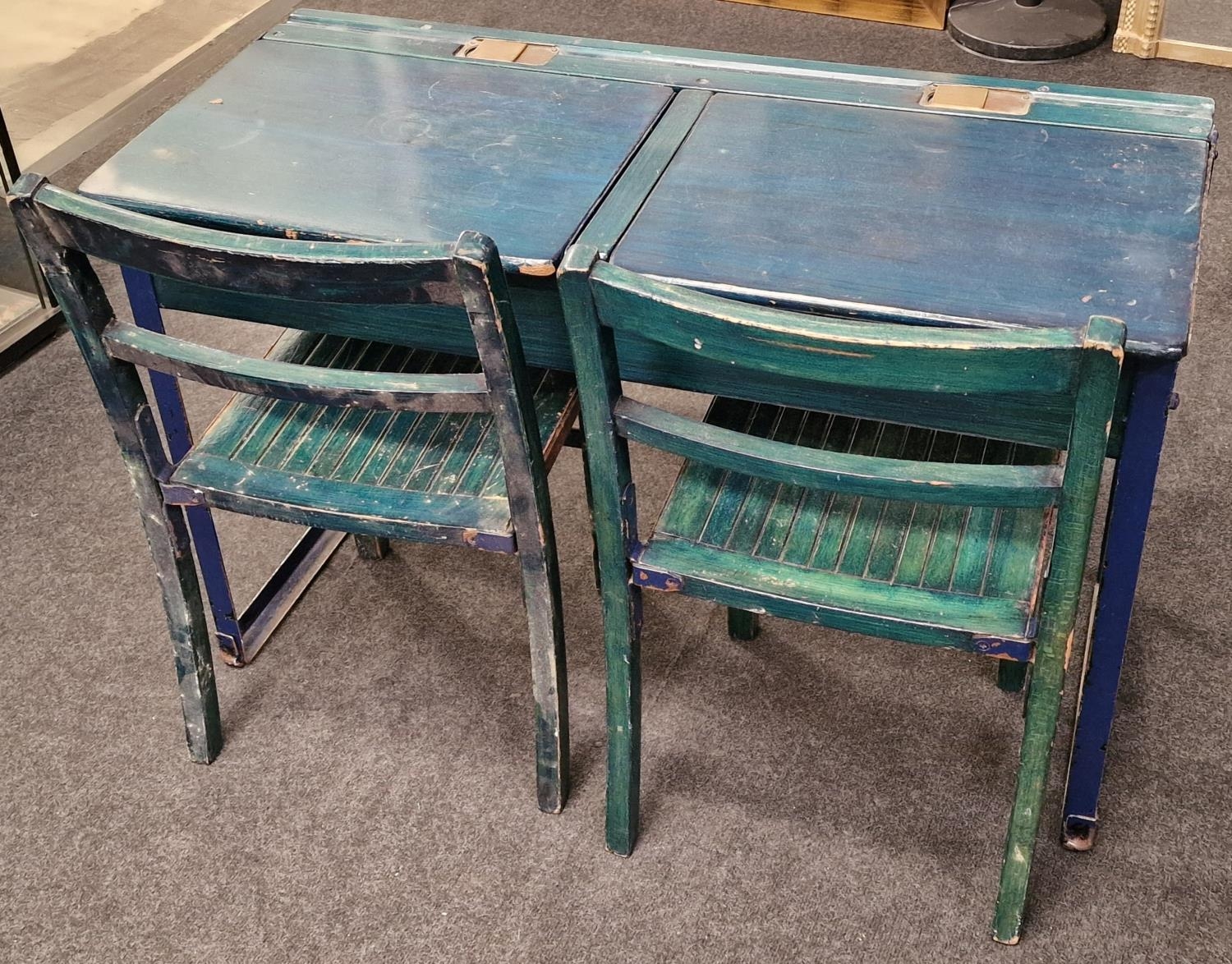 Vintage wooden Childs double school desk with brass inkwell covers, together 2 x chairs, desk is