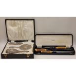 Silver boxed hall marked dressing table set together a bone handled boxed carving set