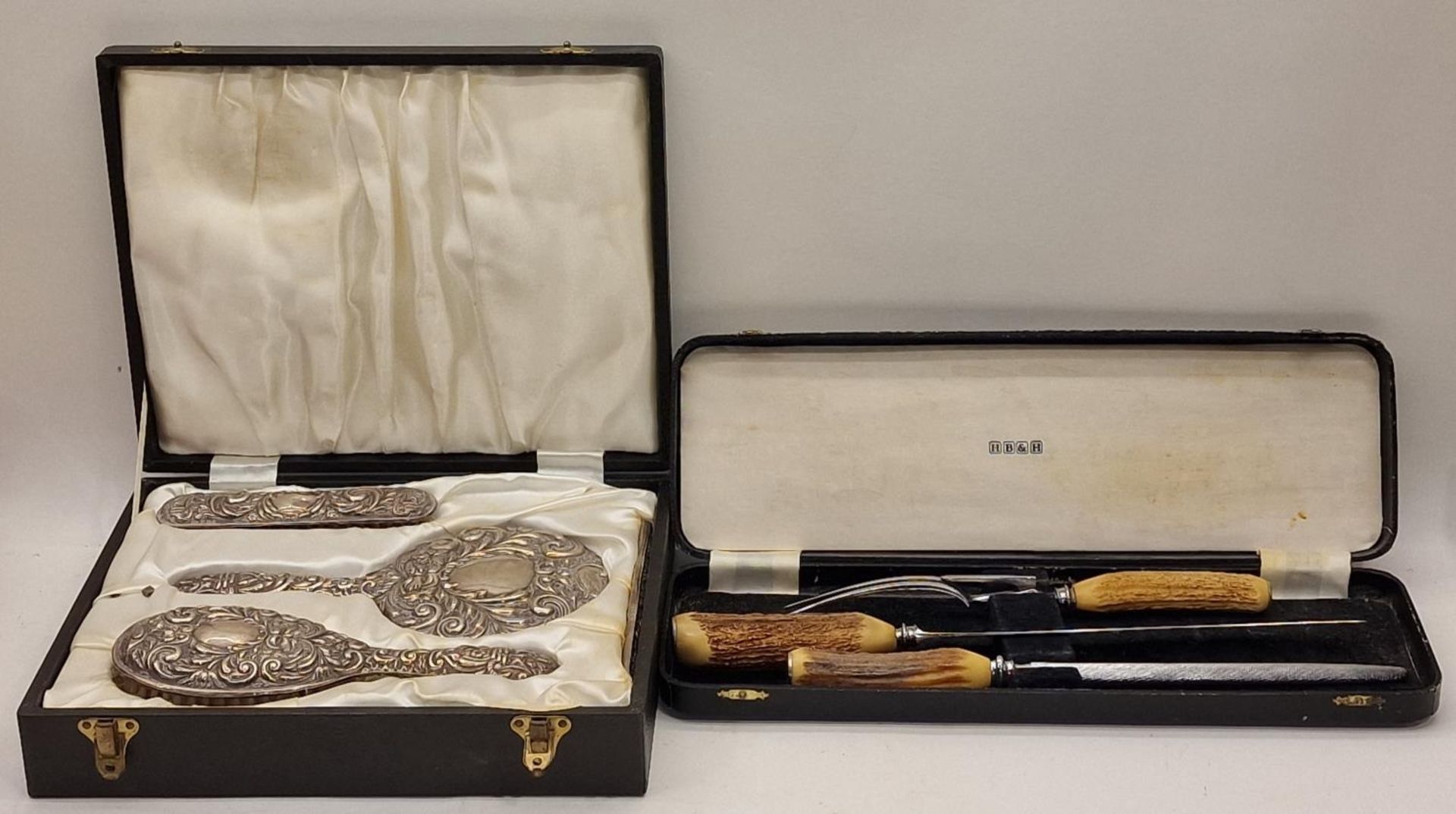 Silver boxed hall marked dressing table set together a bone handled boxed carving set