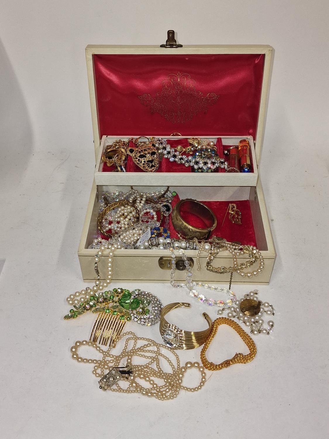 Collection of vintage costume jewellery in a box