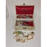 Collection of vintage costume jewellery in a box