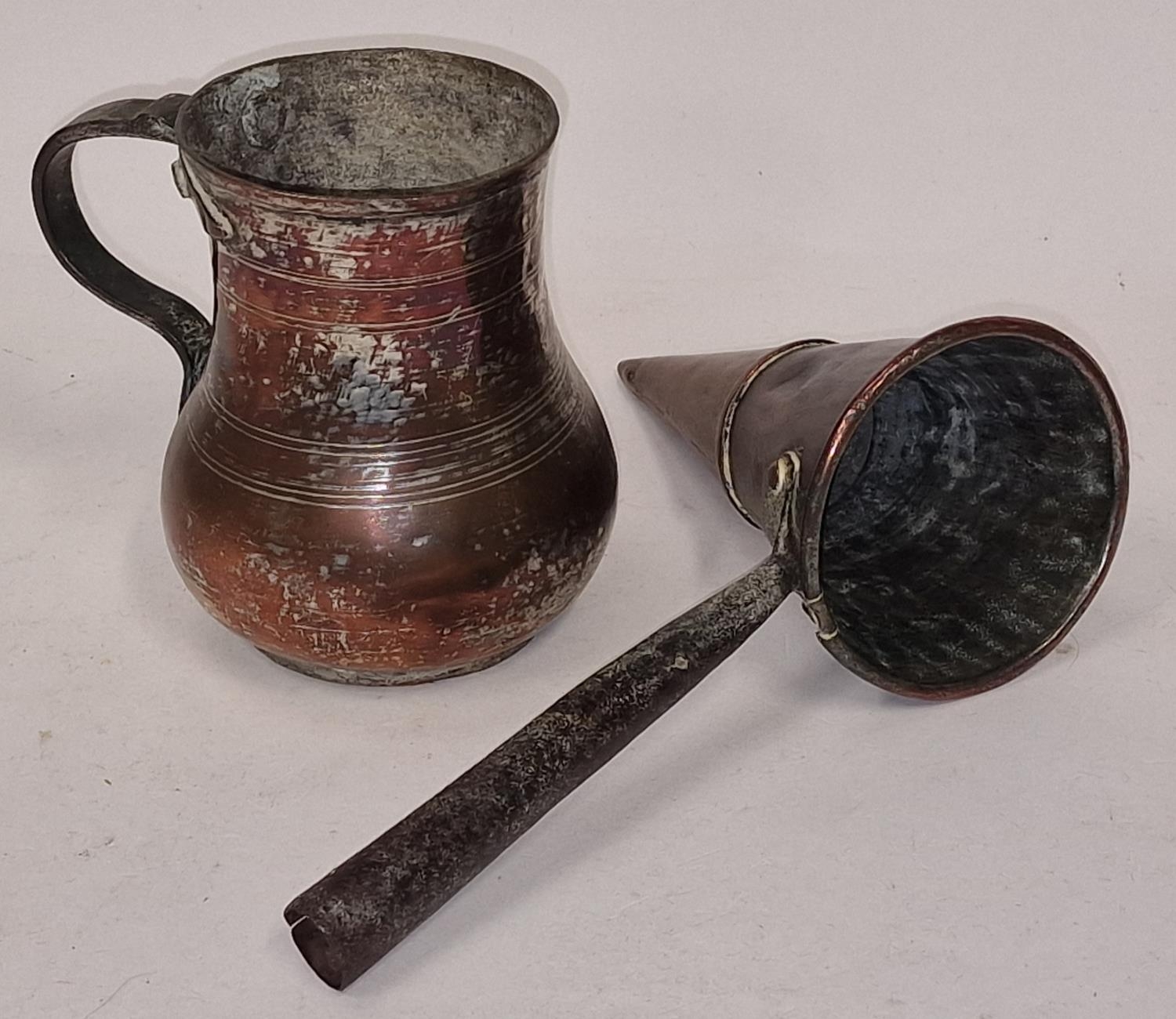 18th century "pointer" ale warmer in copper with wooden handle together with an antique well used
