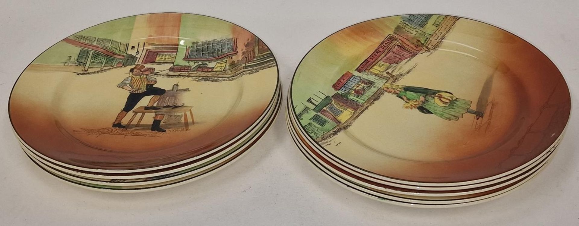 Royal Doulton set of Dickens Ware plates. Total of 9 in lot.