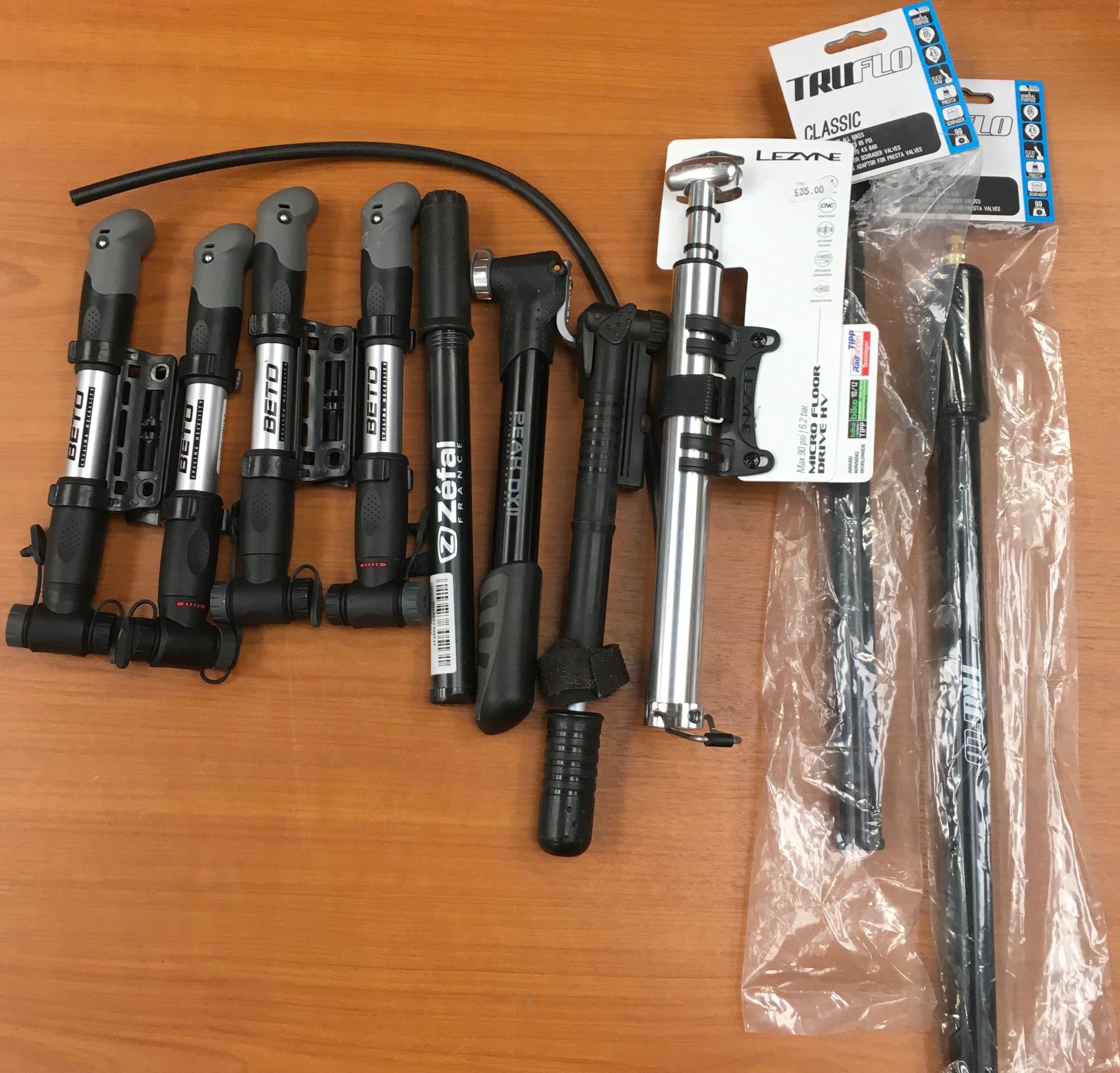 A quantity of bicycle tyre pumps. All new, some carded. 10 items in all