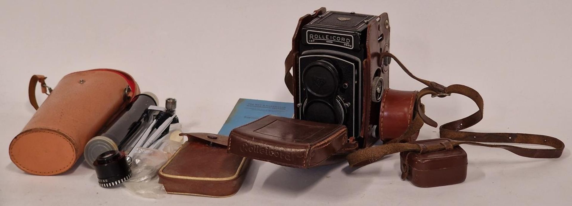 Rolleicord Twin Lens Reflex TLR camera in case together with some other accessories.