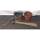 Copper helmet style coal scuttle, round coal box, brass fire utensils and a quantity of brass