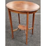 Edwardian mahogany oval inlaid lamp table with slade legs and fitted under tier 70x60x40cm