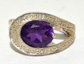 A 925 silver and amethyst cocktail ring Size L 1/2.